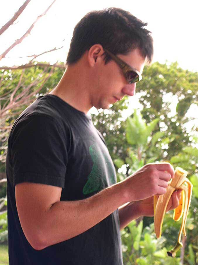 charles inspecting his bananna